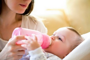 mother feeds  baby